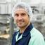 Operations Director Szabolcs Ndoro in a food processing facility